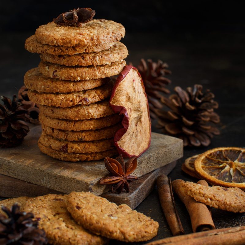 Homemade oatmeal cookies with spices and pine cones